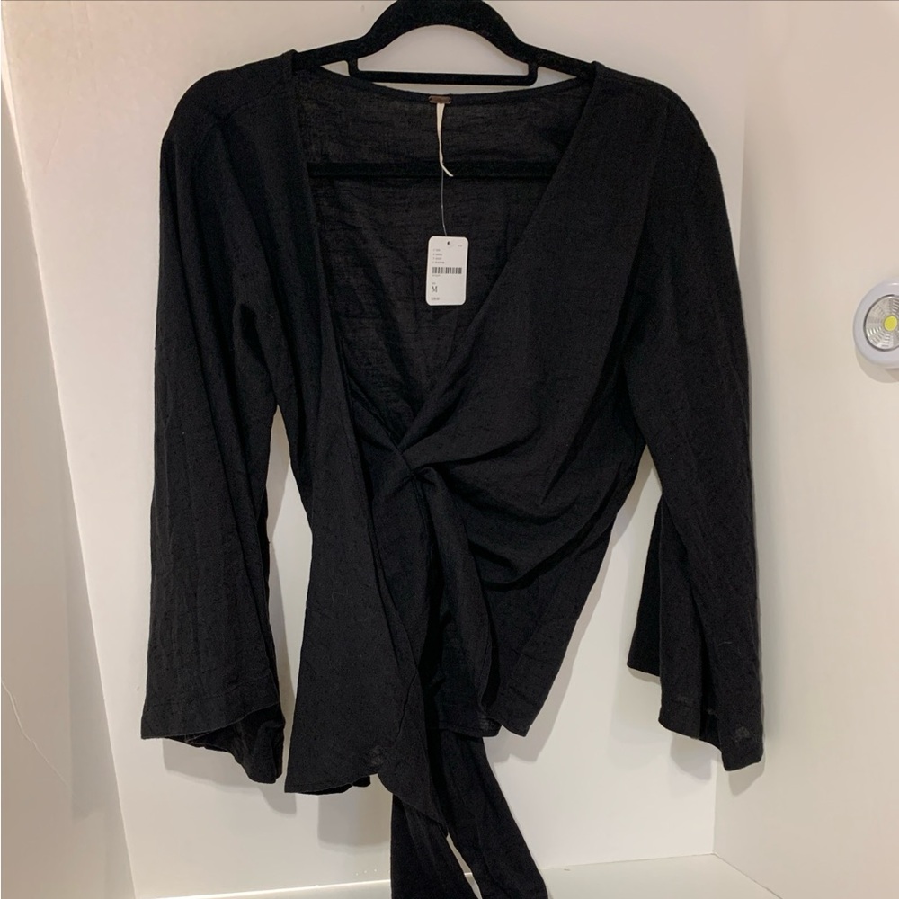Free People wrap around blouse, semi sheer, color: Black, size Med. NWT.
